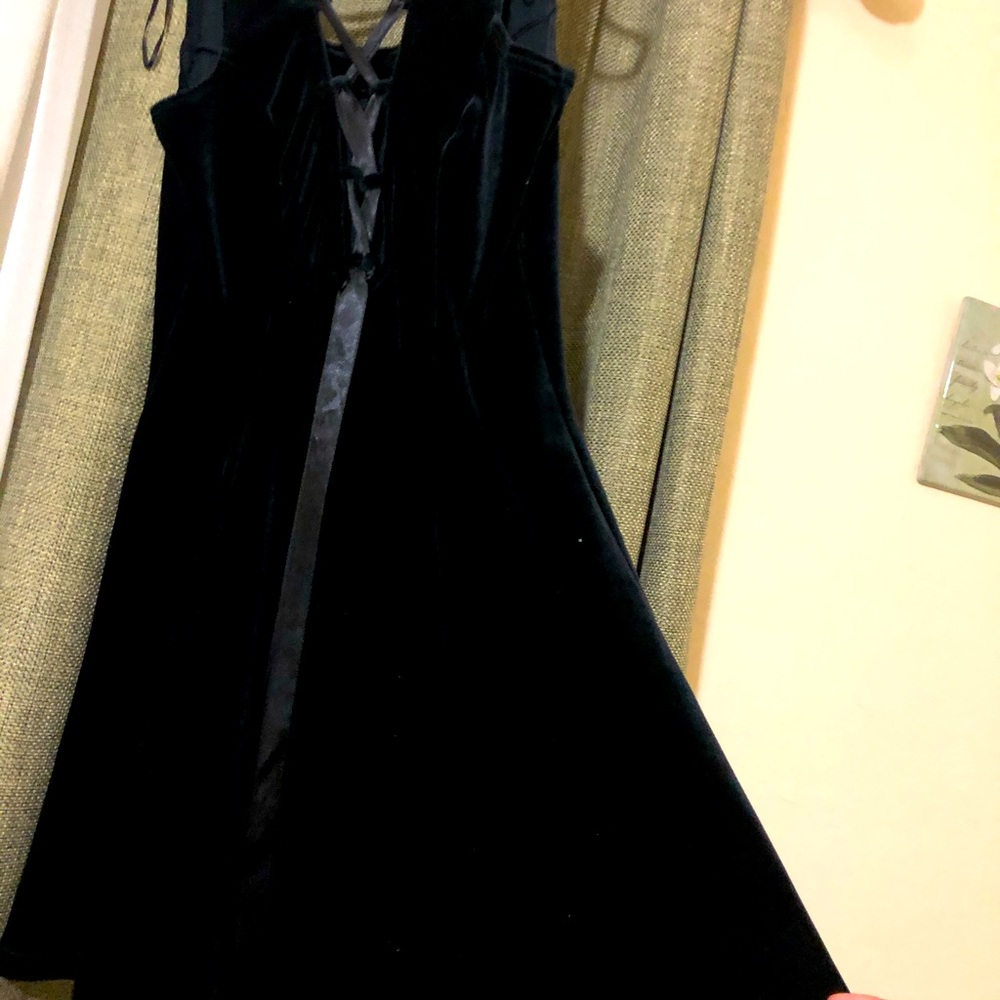 Knee length backless (strapped) dress
